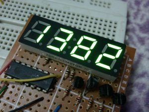 PIC16F877A with 7-segment display and shift register hardware circuit
