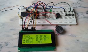 Real time clock with alarms using PIC16F877A and DS1307