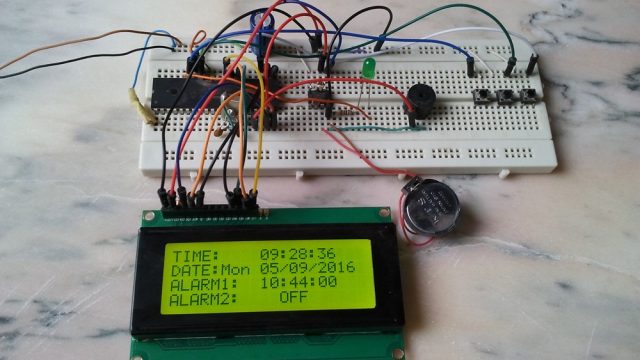 Real time clock with alarms using PIC16F877A and DS1307