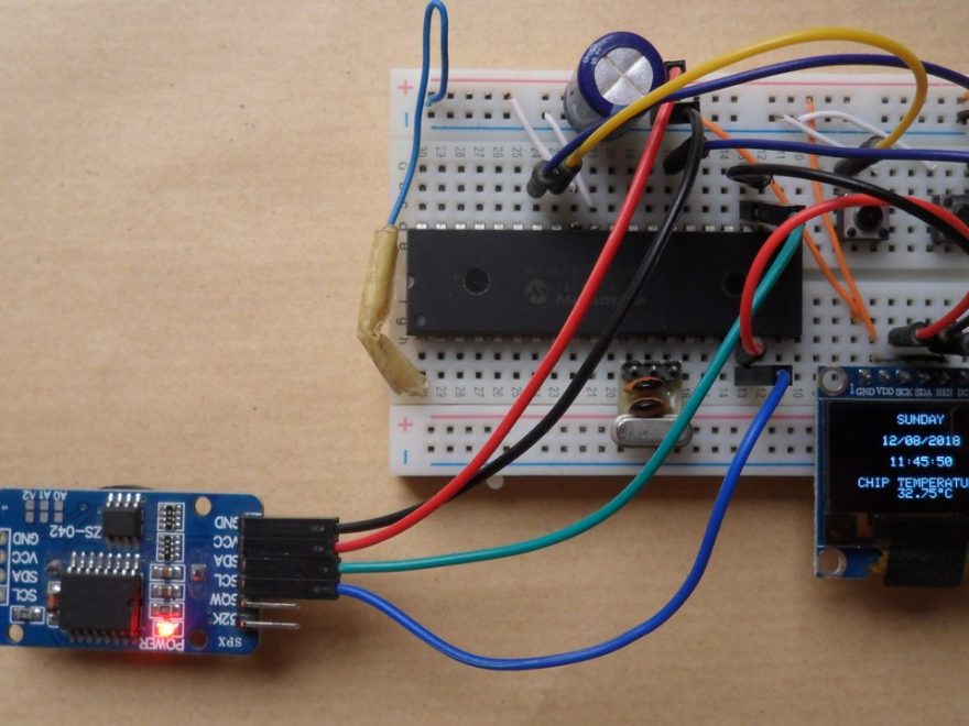 PIC16F877A with DS3231 RTC and I2C SSD1306 OLED display
